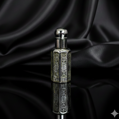 Silver perfume bottle on a black satin background